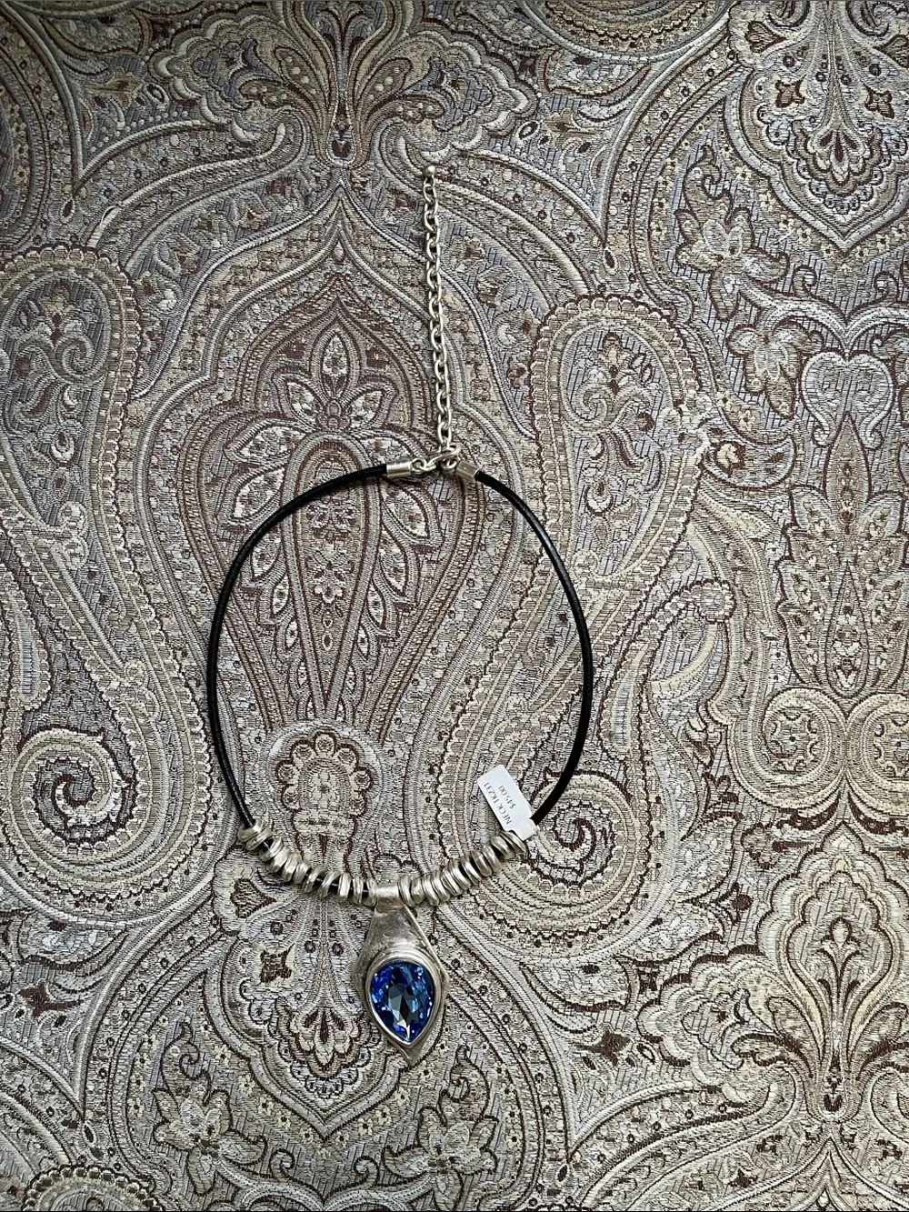 Silver-Plated Necklace with Blue Teardrop Pendant on Black Cord